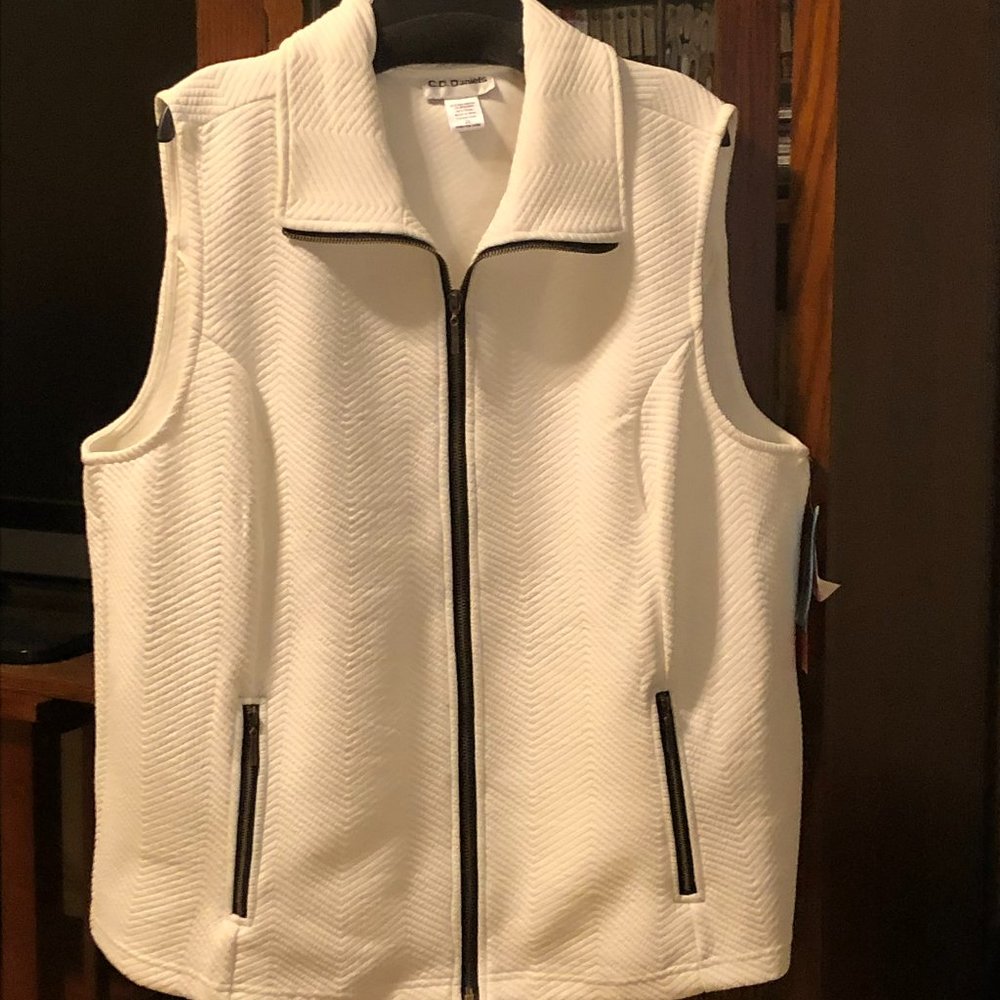 White sleeveless zip front vest